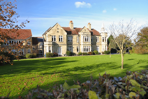 Soham Village College logo